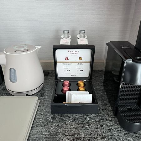 Centara Grand Hotel Osaka Exteriör bild A Nespresso coffee machine in a hotel room